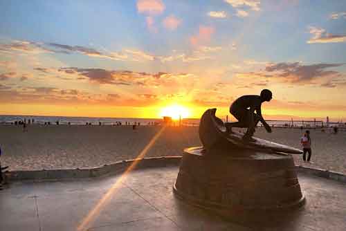 Hermosa Beach surfer sunset